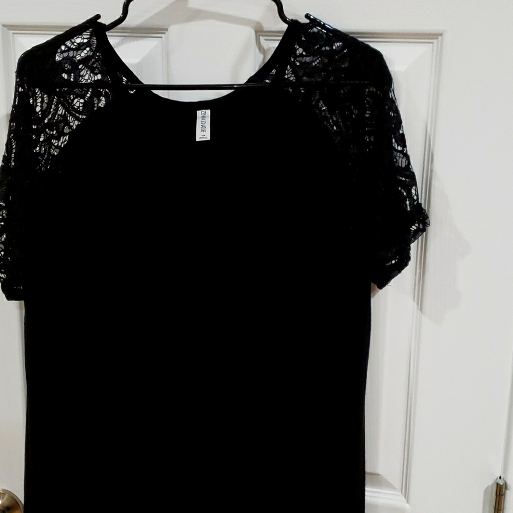 Tunic length top with lace sleeves